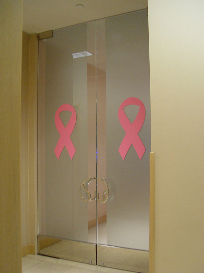 Etched vinyl privacy screen with vinyl decal bows